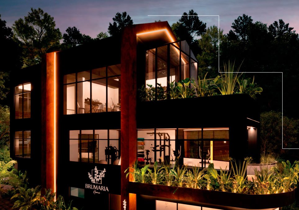 Casa club del condominio Brumaria Homes con amplias ventanas, gimnasio y terrazas verdes con jardineras