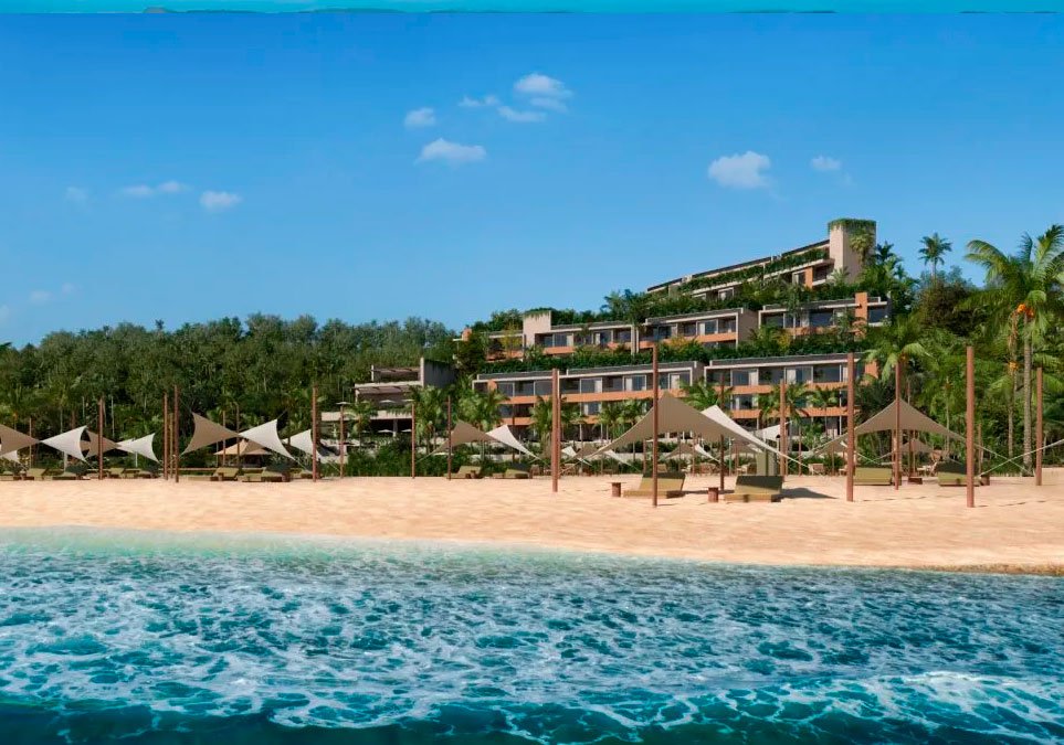 Vista del complejo Mawala Cartagena desde la playa privada frente al mar Caribe