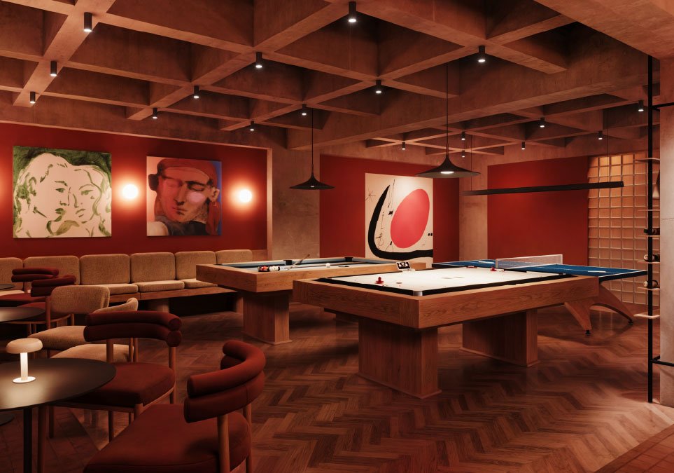 Sala de juegos moderna en Wonder Coliving con mesas de billar, ping pong y zona social con sofás
