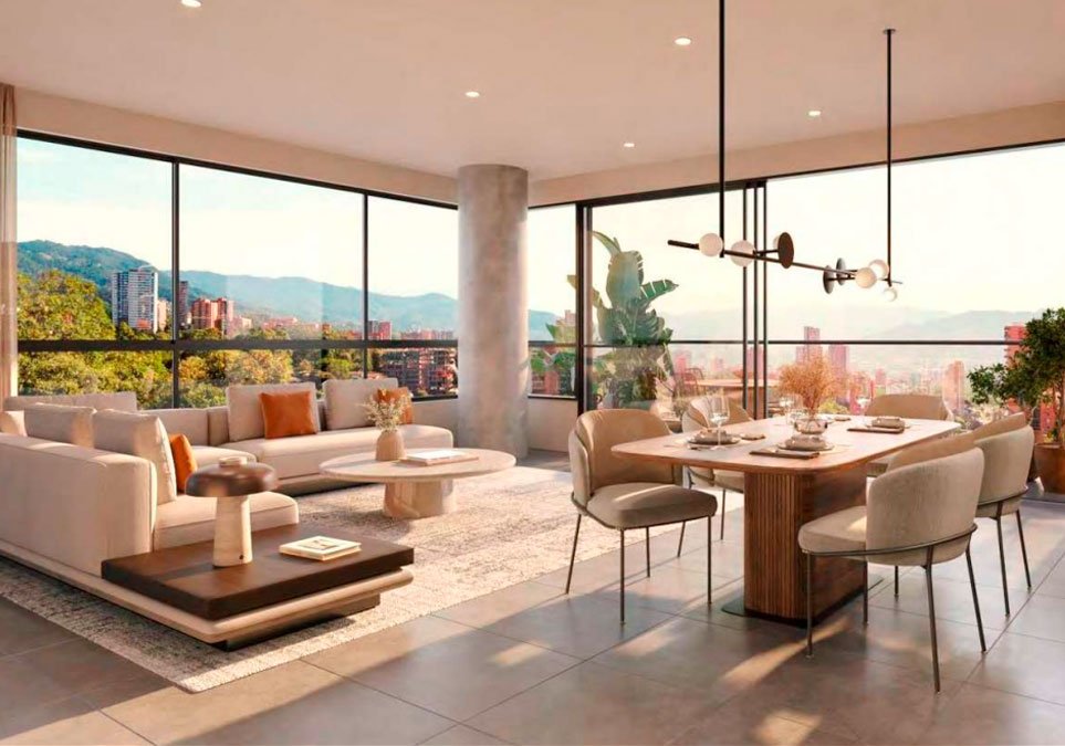 Interior de un apartamento moderno con sala y comedor iluminados, grandes ventanales y vista panorámica a la ciudad de Medellín.