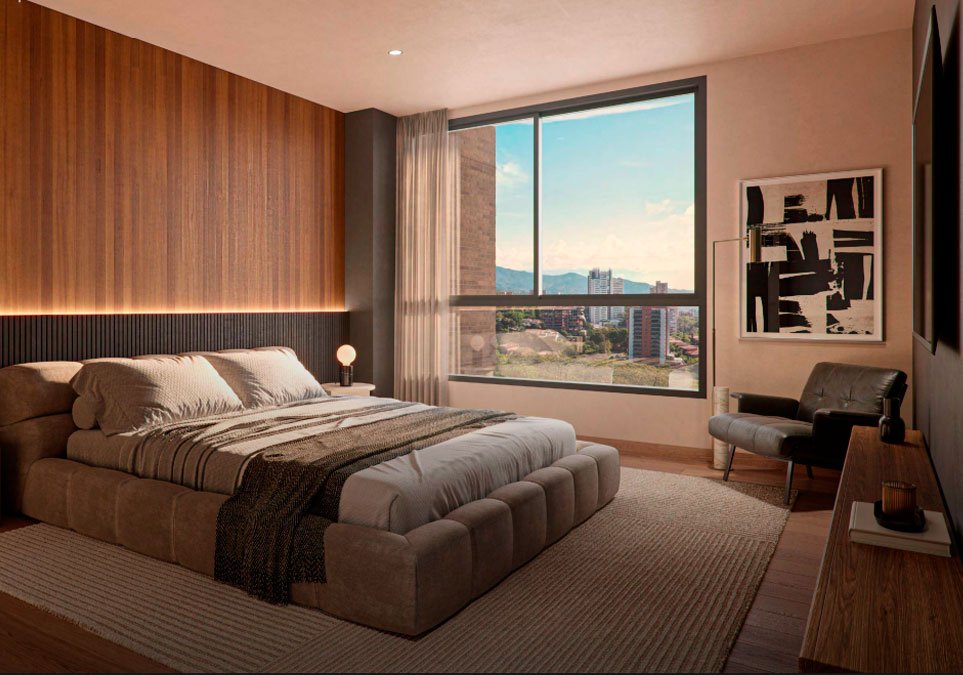 Habitación principal de un apartamento del proyecto Treebal Medellín, con diseño cálido en madera, cama amplia, ventanal grande y vista a la ciudad.